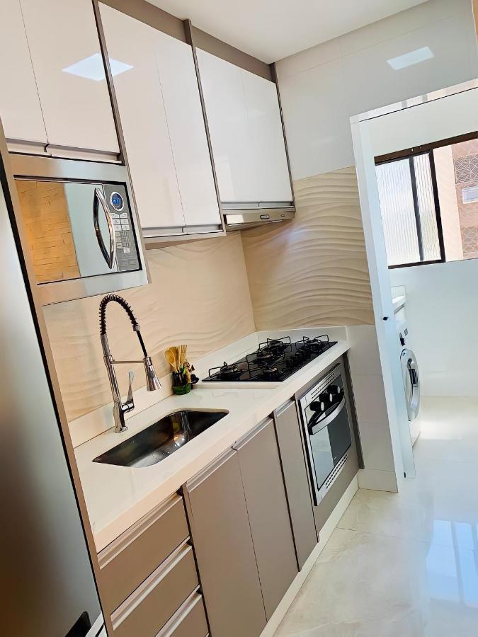 Apartamento Top De Linha Praia Da Enseada กัวรูจา ภายนอก รูปภาพ